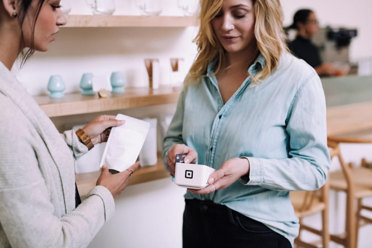 Serving a customer at a counter